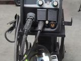 an image of a welding machine in a garage