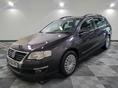 a picture of a volkswagen passat wagon parked in a garage
