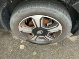 a close up of a tire on a car ' s rim