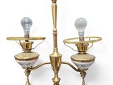 an image of a three light brass chandelier on a white background