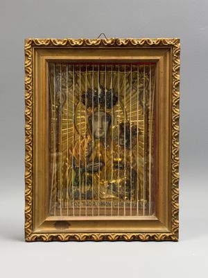an image of a picture of jesus in a cage in a wooden frame