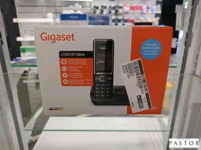 a box with a phone inside of it on display