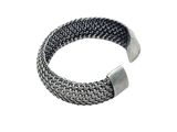 silver bracelet with a metal clasp on a white background