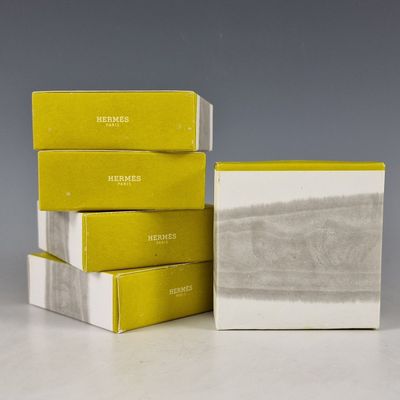 three books stacked on top of each other on a table