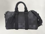louis vuitton damier speedy bag in black and grey checkered