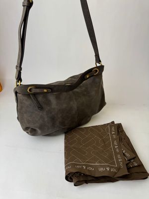brown leather purse with a matching scarf and matching wallet