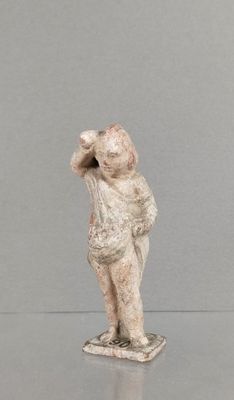 une image représentant la statue d'un homme coiffé d'un chapeau
