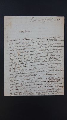 un gros plan d'un morceau de papier sur lequel on a écrit
