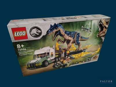 une boîte de Lego avec un dinosaure dessus
