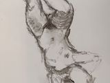 a drawing of a nude woman sitting on her stomach