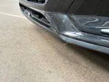 a close up of the front bumper of a car