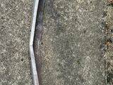a metal object that is laying on the ground