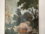 a painting on the wall above a couch in a living room