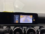 the dashboard of a car with a rear view camera mounted on the dash