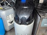a blender sitting on top of a counter next to other appliances