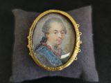 portrait d'un homme vêtu d'un manteau bleu, une pipe à la main