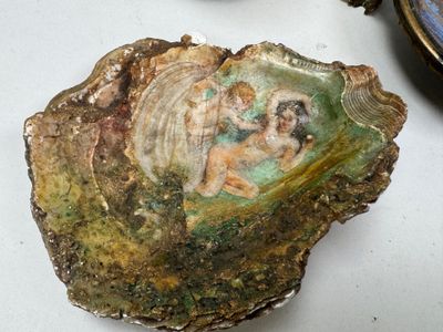 a shell with a picture of a woman on it