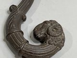 a close up of a door handle with a lion head on it