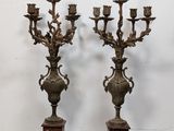 pair of antique brass candelabs with flowers and leaves
