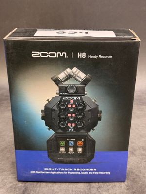 the box for the zoomon h8 camera is open and ready to be used