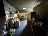 a room full of boxes and boxes on the floor