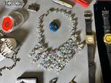 a table with a lot of jewelry on it