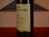 a bottle of wine that is sitting on a table