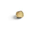 a close up of a gold ring on a white surface