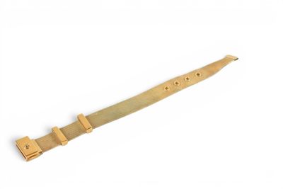 a knife with a wooden handle on a white surface