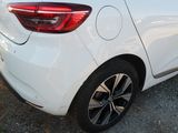 a white car parked on the side of the road