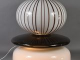 a lamp that is sitting on top of a table
