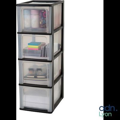 a close up of three plastic drawers on a white background