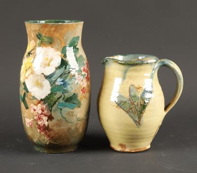 two vases that are sitting next to each other