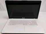 an open laptop computer sitting on top of a white table