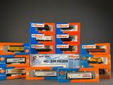 a lot of toy trains that are sitting on a table