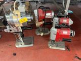two machines that are sitting on a red floor