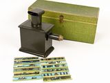 a small box and a box of matches on a white surface