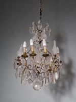LUSTRE CAGE en bronze doré à douze bras de lumières mouvemen…