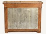 a wooden cabinet with a mirror on top of it