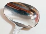 a spoon that is sitting on a table