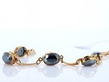 gold plated bracelet with black glass beads and gold chain