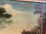 a painting on the wall of a room with a painting on it