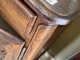 a wooden table with a drawer on top of it