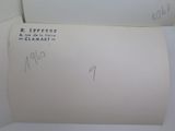 a piece of paper with writing on it sitting on a table