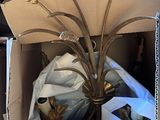 a cardboard box with a bunch of items inside of it