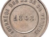 une vieille pièce d'argent portant la date de naissance du président