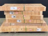 several stacks of wooden pallets stacked on top of each other in a warehouse