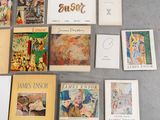 many books that are on the floor next to each other