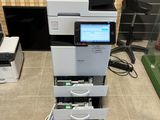 a printer that is sitting on top of a table
