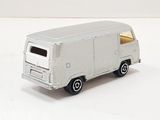 a toy van that is sitting on a white surface